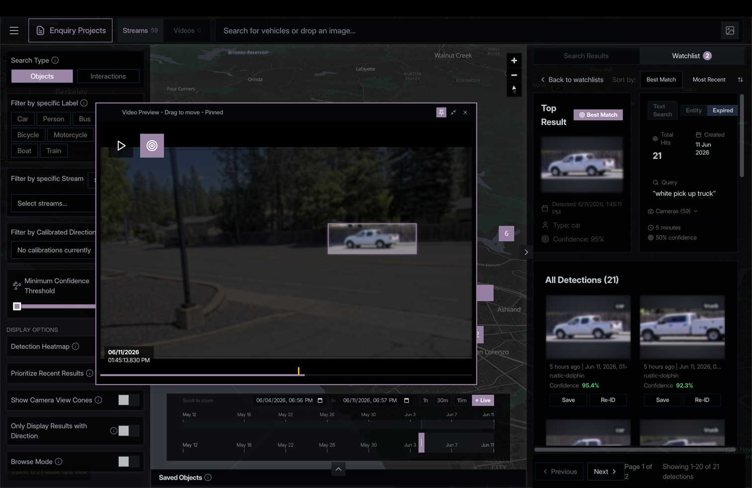 Search results with inline video preview for a white pickup truck query